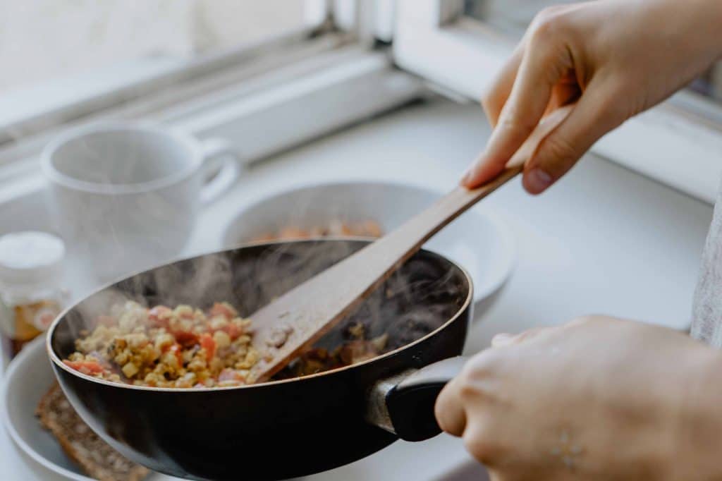 Pan with food and steam